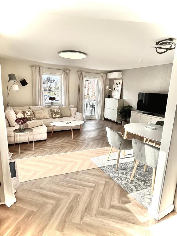a living room with a couch and a table at Fewo Anna in Bernkastel-Kues
