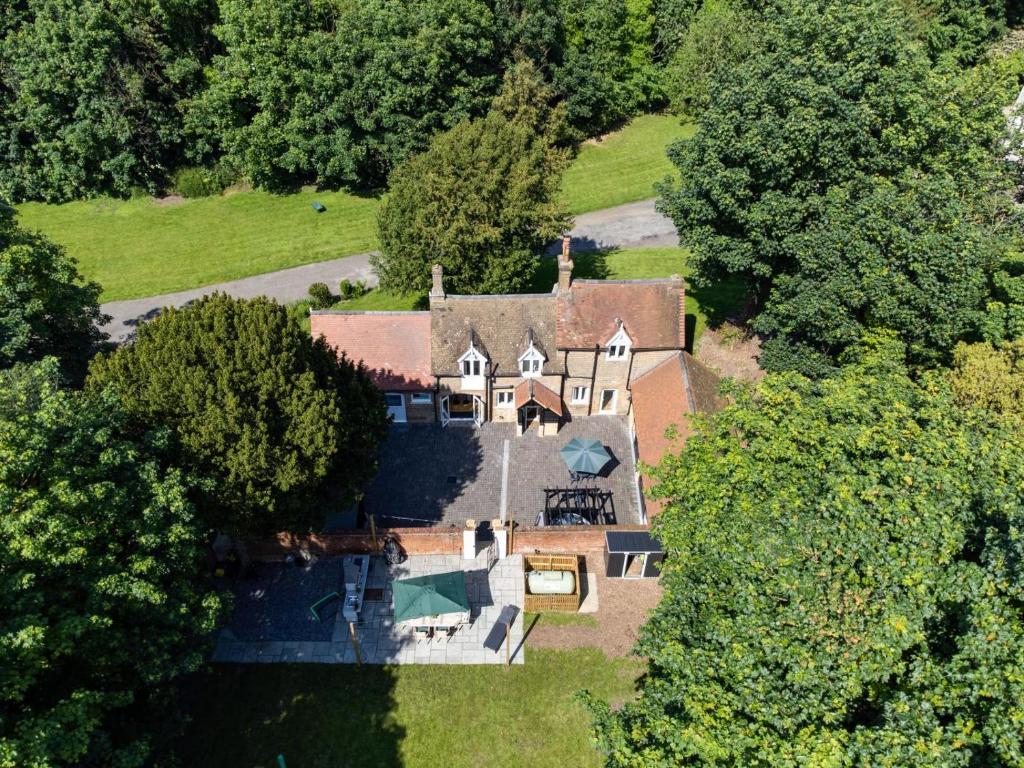 an aerial view of a large house with trees at 4 Bed in Broadstairs oc-w28331 in Broadstairs