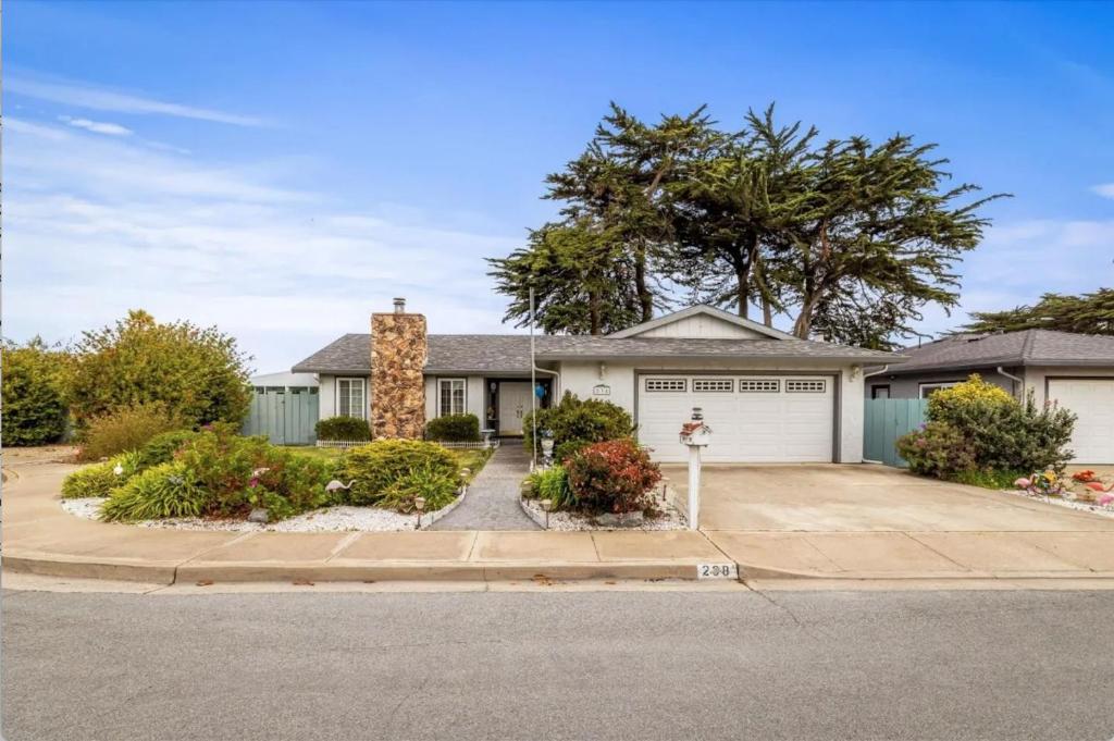 a house with a parking meter in front of it at STR25-15 Home 3 Bedrooms 2 Bath in Marina