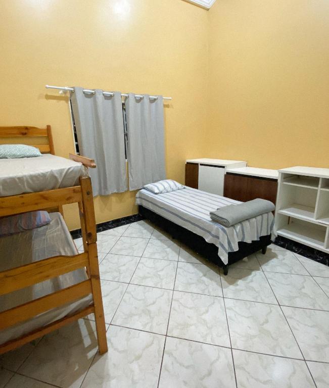 Pousada Acessus - Com Cozinha e Lavanderia - Quarto Triplo Básico Com Banheiro Compartilhado