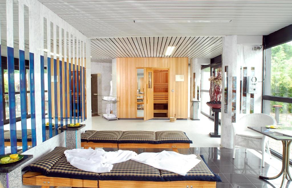 Postel nebo postele na pokoji v ubytování Hotel Scheidberg
