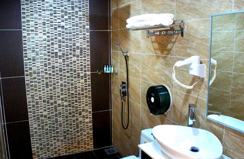Koupelna v ubytování Kingsley Hotel