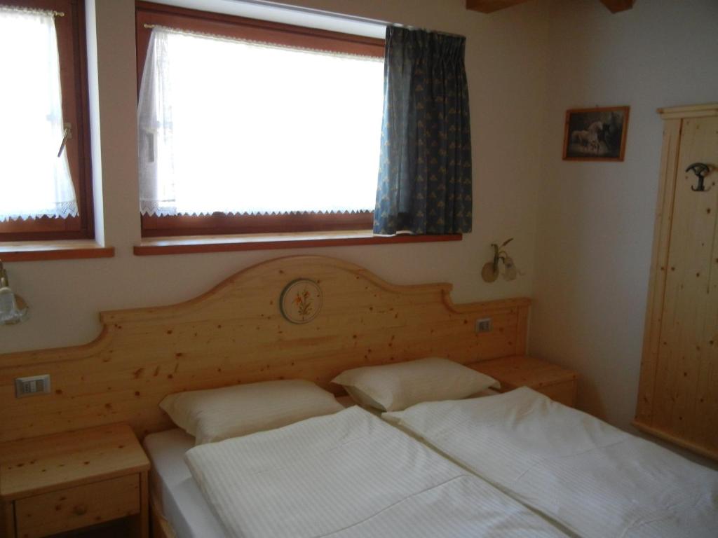 Postel nebo postele na pokoji v ubytování B.& B. Corradini