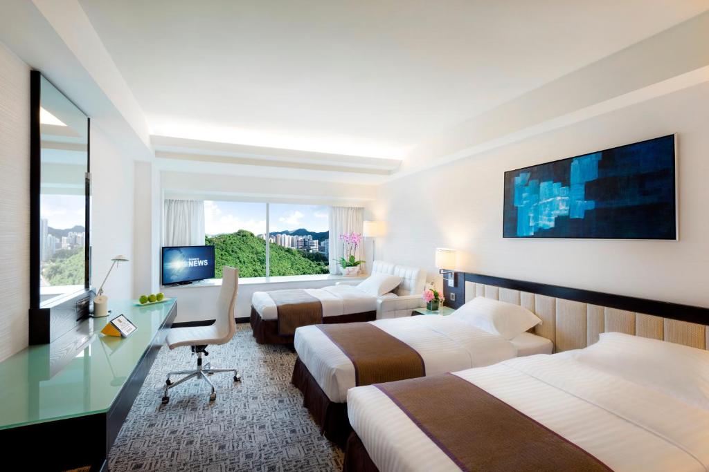 Televiisor ja/või meelelahutuskeskus majutusasutuses Regal Riverside Hotel