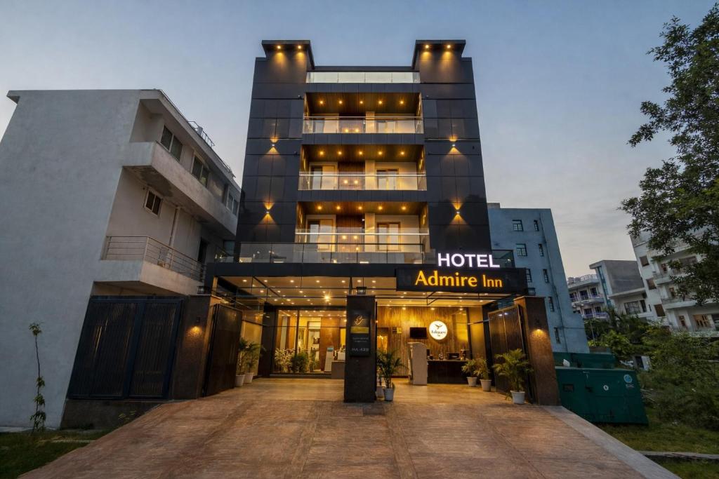 a building with a hotelamine inn sign on it at Hotel Admire Inn Sec - 104 By ASPL in Noida