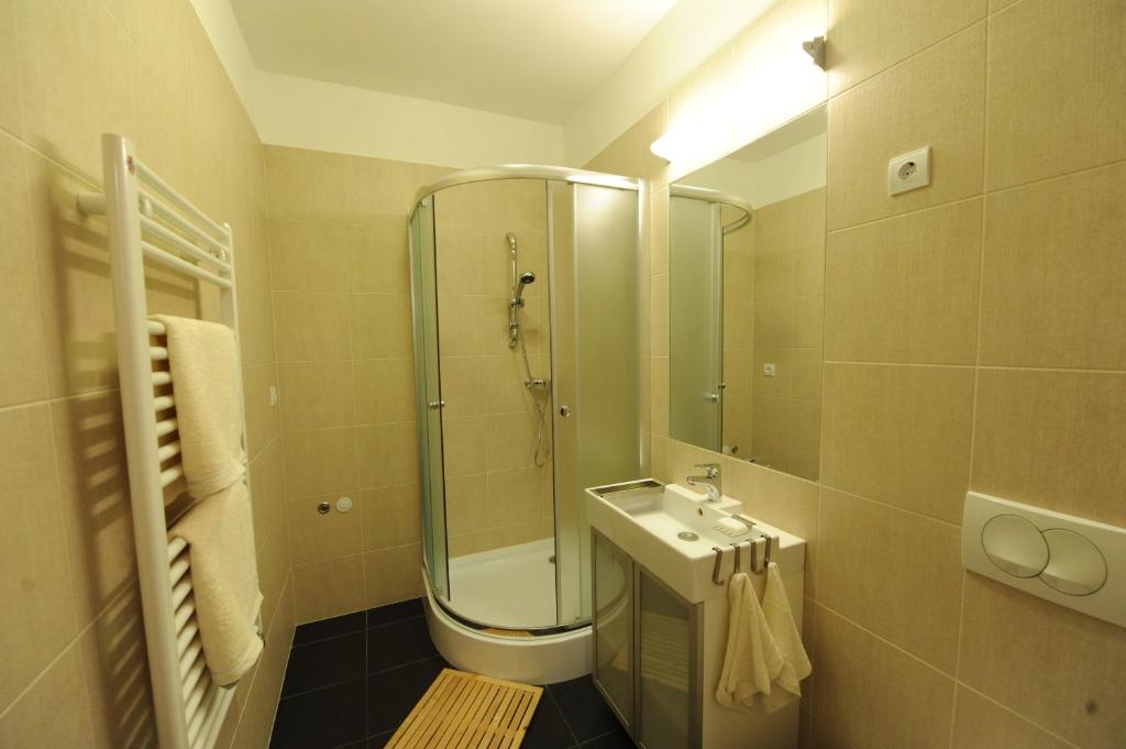 Kúpeľňa v ubytovaní Toldi Apartments Pécs