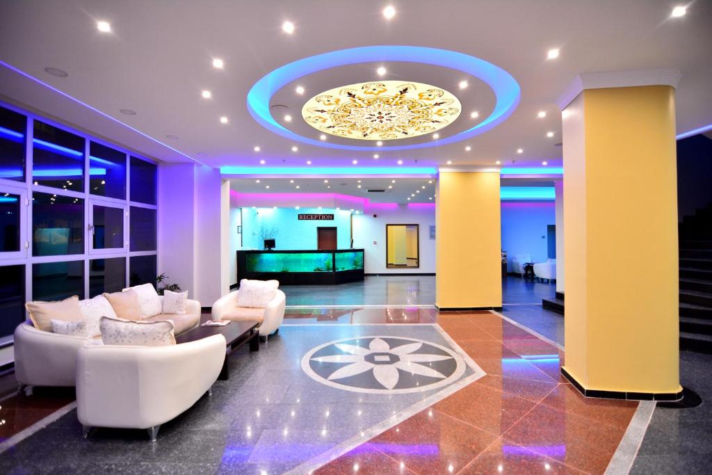 TV a/nebo společenská místnost v ubytování Ananas Hotel