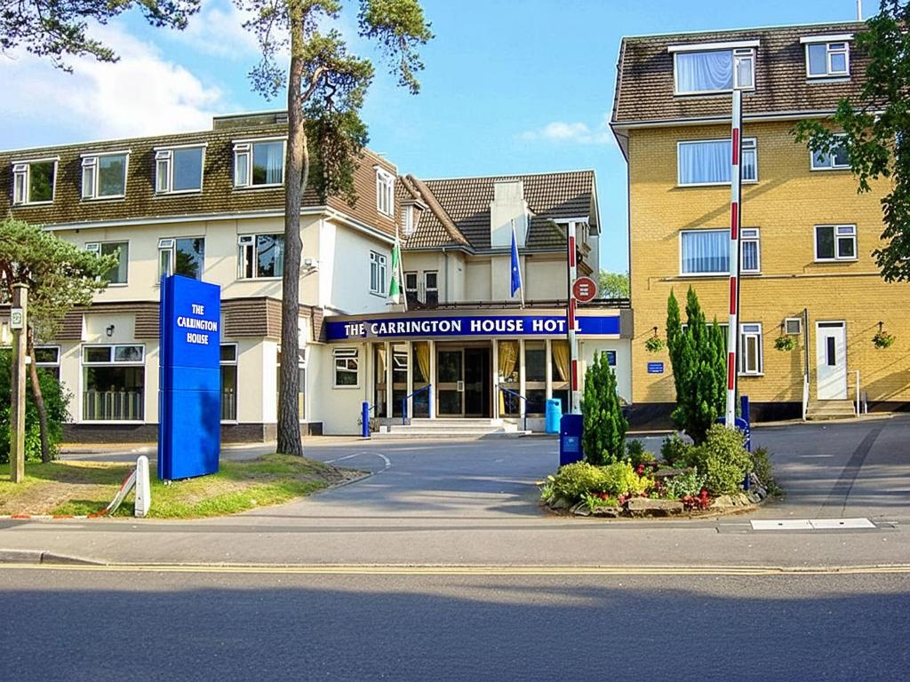 a building with a sign that reads the hammond house hotel at Carrington House Hotel in Bournemouth