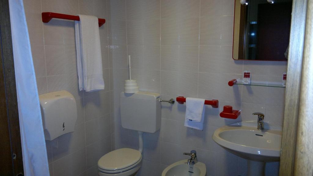 Koupelna v ubytování Albergo Casa dell'Ospite