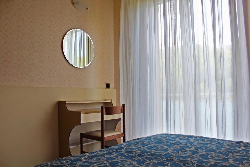 Ліжко або ліжка в номері Hotel Royal