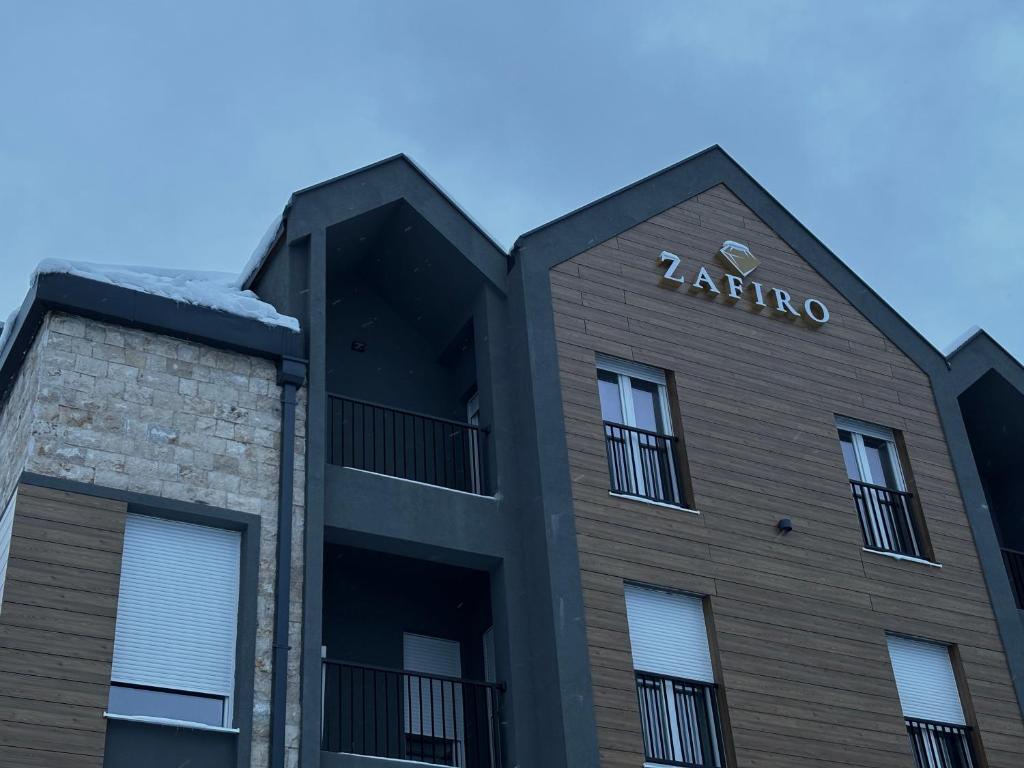 a building with the name raalo on it at City Garden II in Kolašin