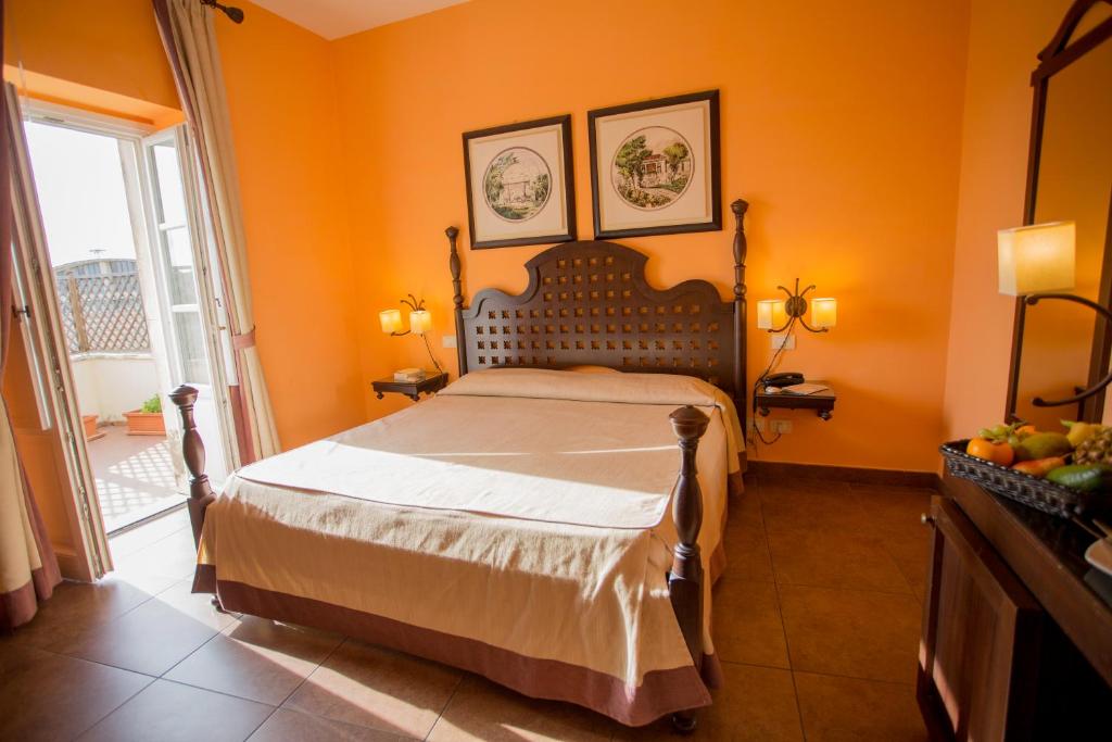 Postel nebo postele na pokoji v ubytování Hotel dei Coloniali