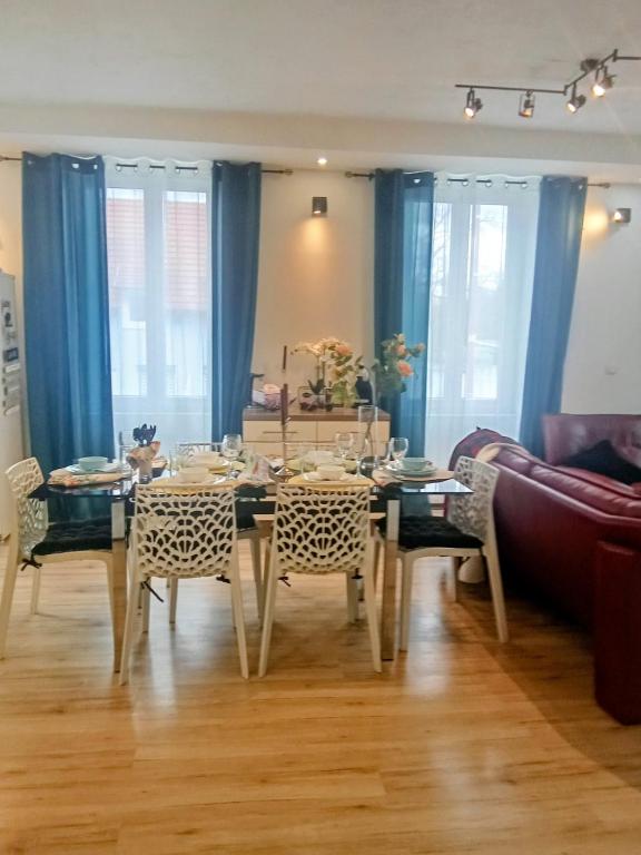a dining room with a table and chairs at Glamorous flat in Mertzwiller in Mertzwiller