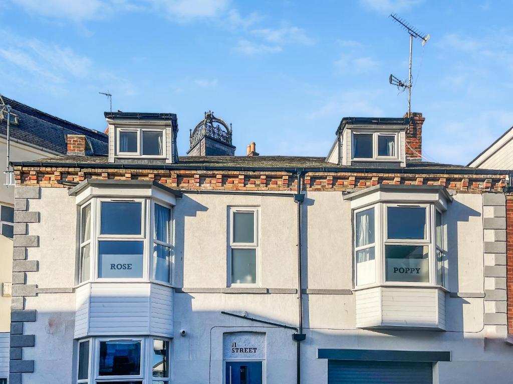 a white building with two windows on top of it at Lily - Uk49362 in Bridlington