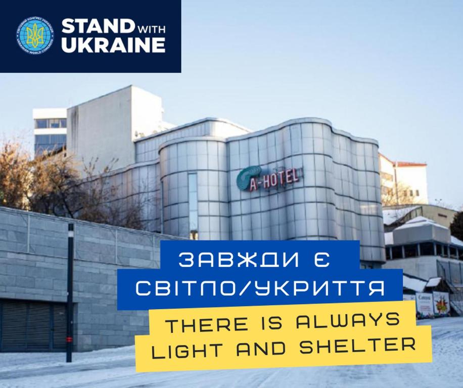 a building with a sign in front of it at Campus Community A-Hotel in Kyiv