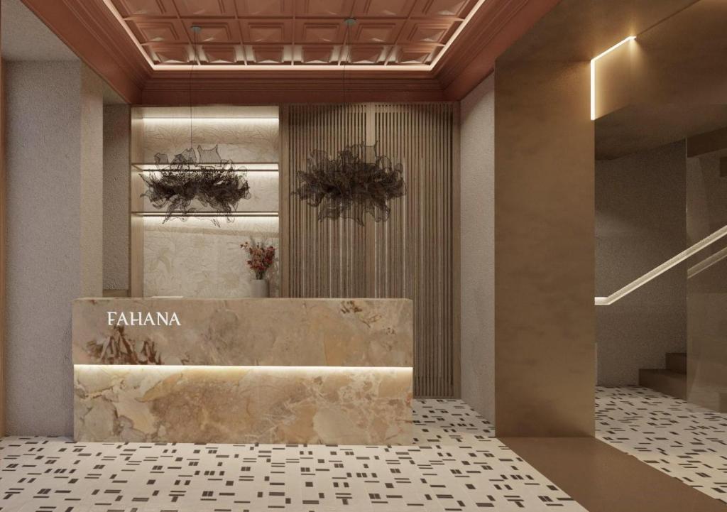 a lobby with a reception desk in a building at Fahana Triana 54 Adults Only in Las Palmas de Gran Canaria