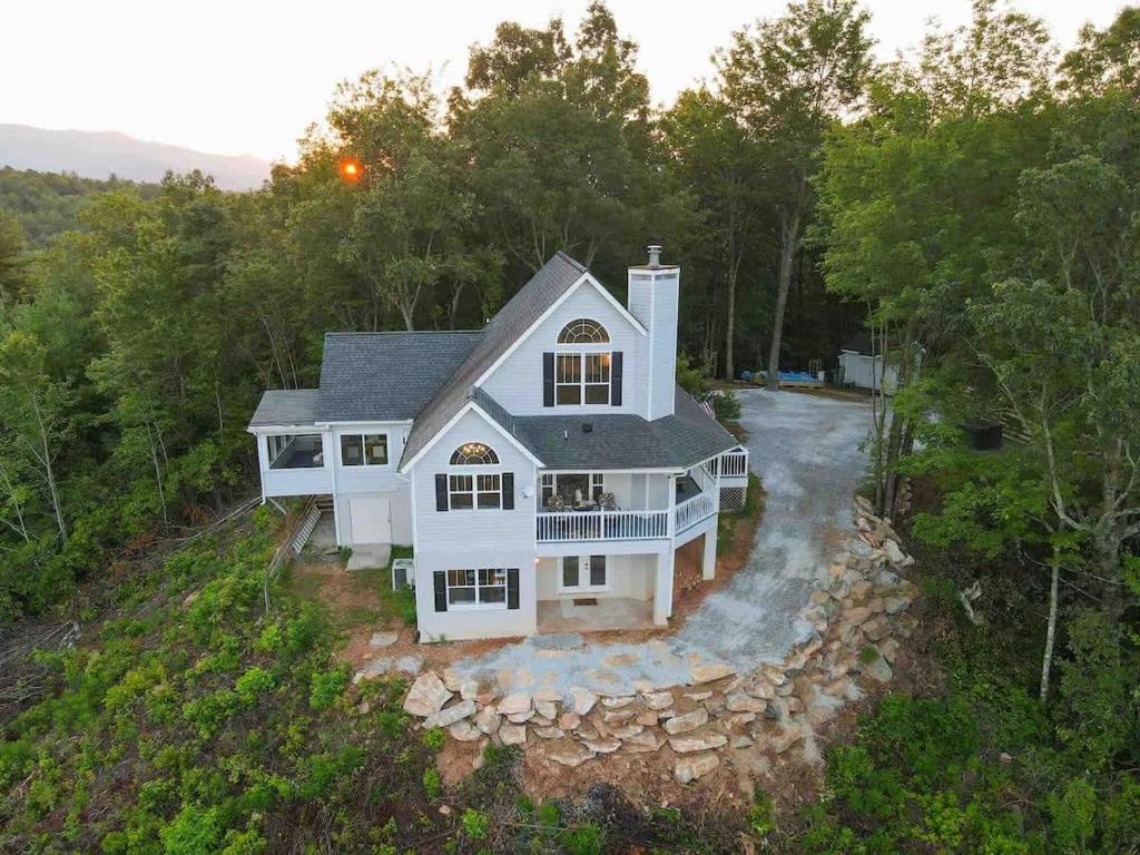 an aerial view of a large white house at Sky Harbour in Andrews