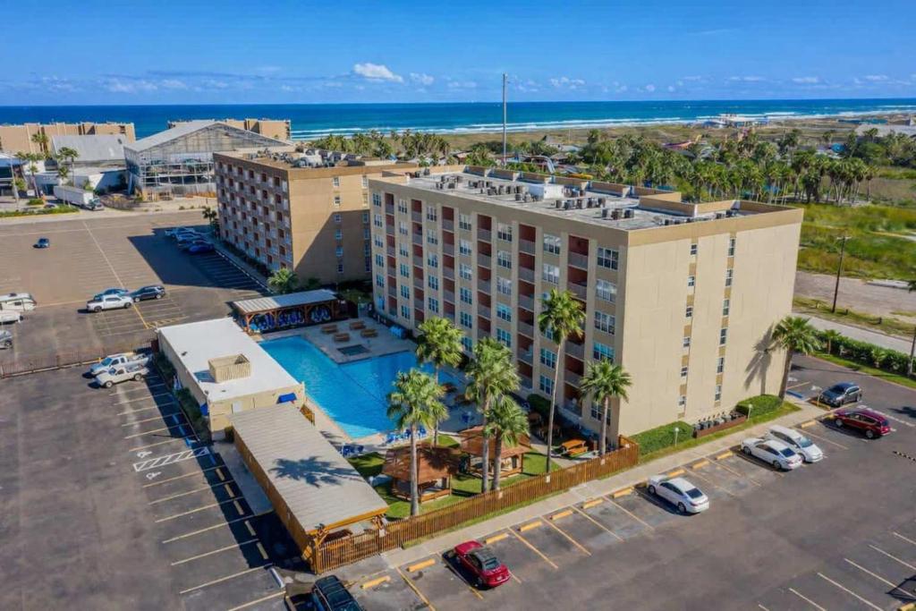 an aerial view of a hotel with a parking lot at Gulfview II #410 Luxe in South Padre Island