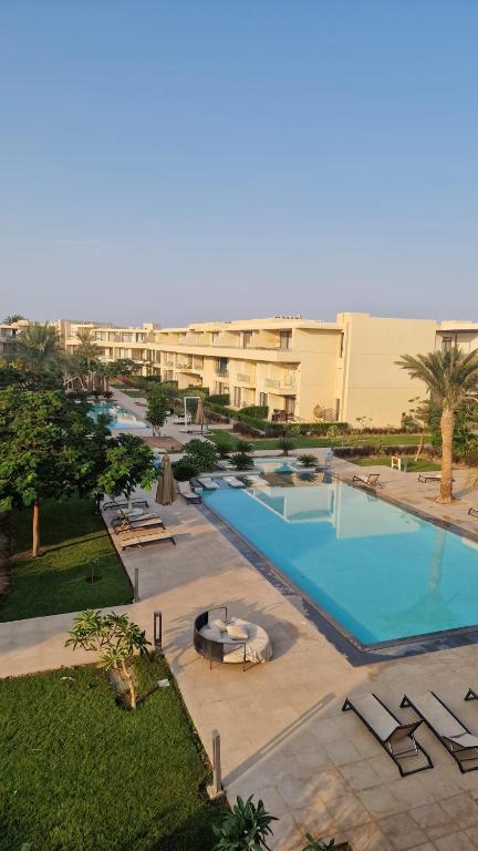 an overhead view of a swimming pool in a resort at Penthouse El Gouna, Hurghada in El Gouna