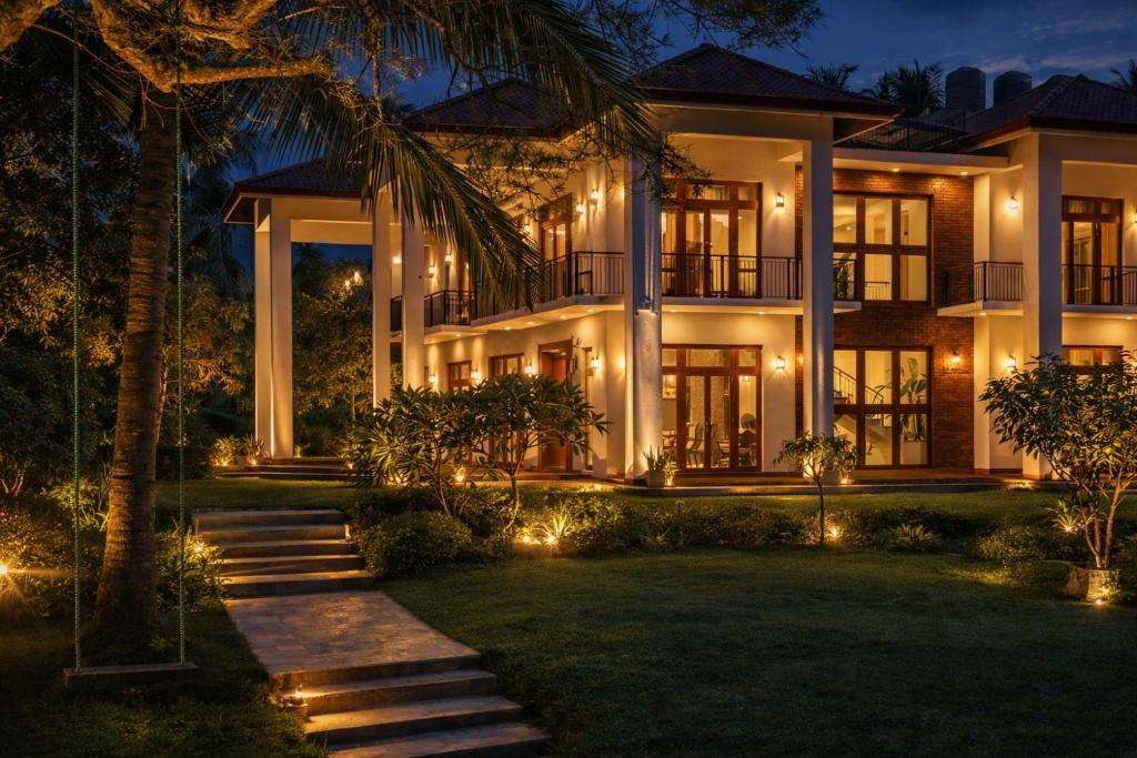 a house with lights in front of it at night at Welpalla Signature in Welpalla