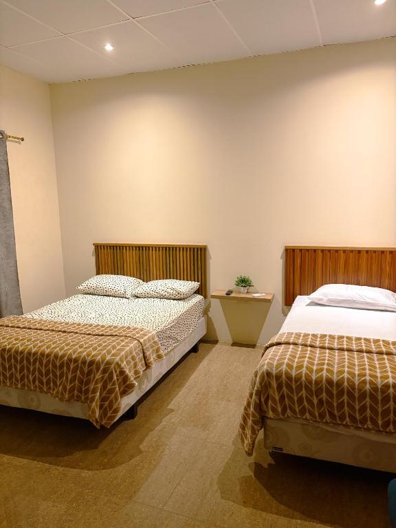 Llit o llits en una habitació de Kicker House