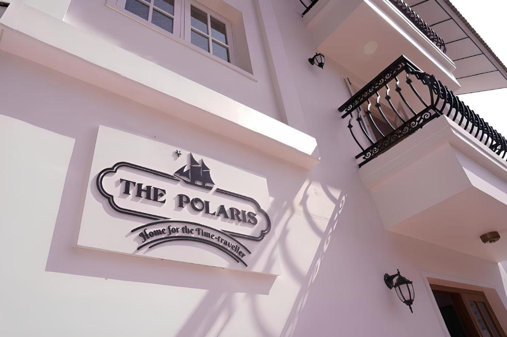 a sign for the polands on the side of a building at The Polaris in Cochin