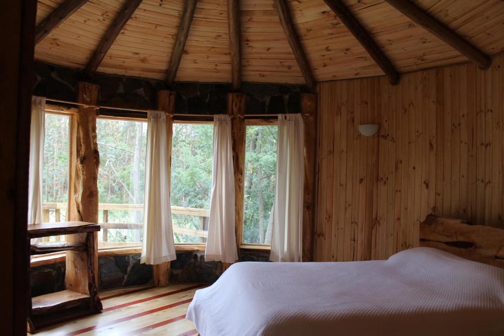 Postel nebo postele na pokoji v ubytování Reserva los Bollenes