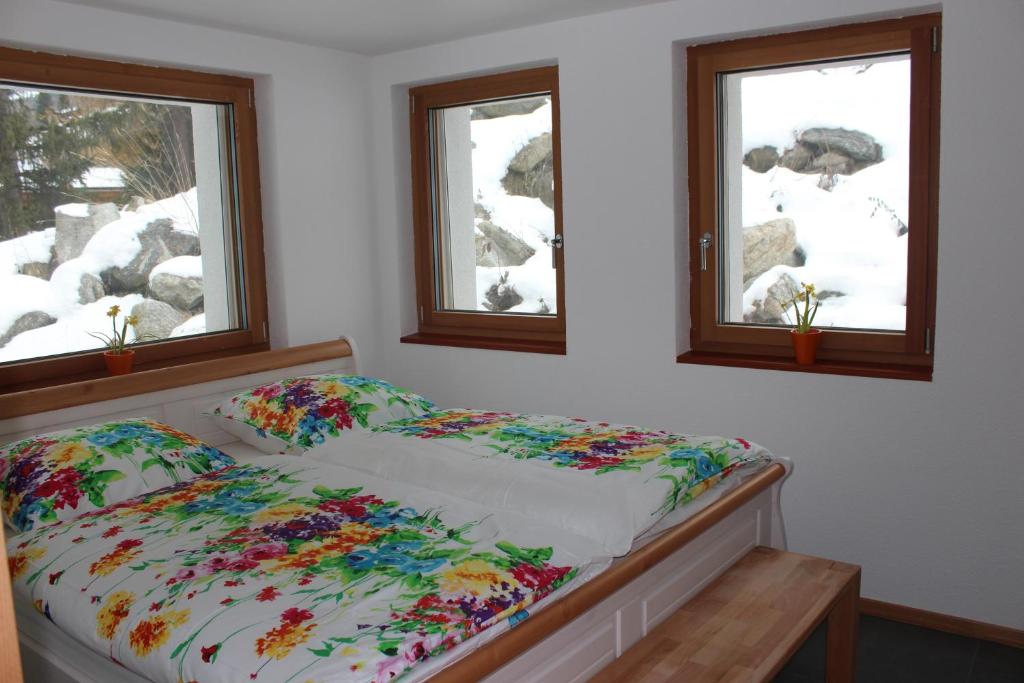 Ένα ή περισσότερα κρεβάτια σε δωμάτιο στο Chalet du Chef