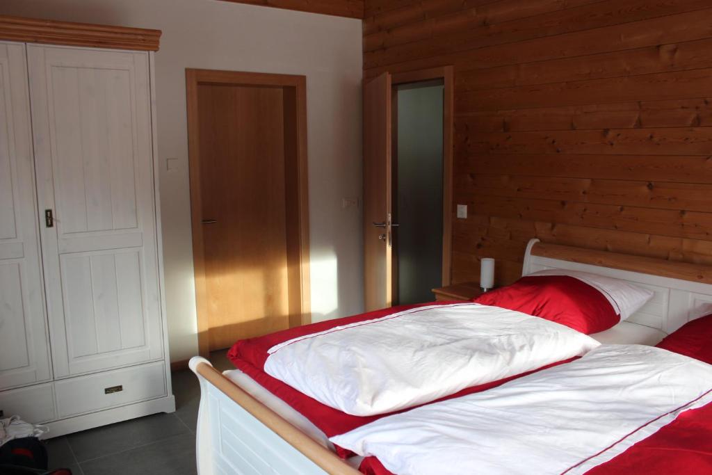 Ένα ή περισσότερα κρεβάτια σε δωμάτιο στο Chalet du Chef