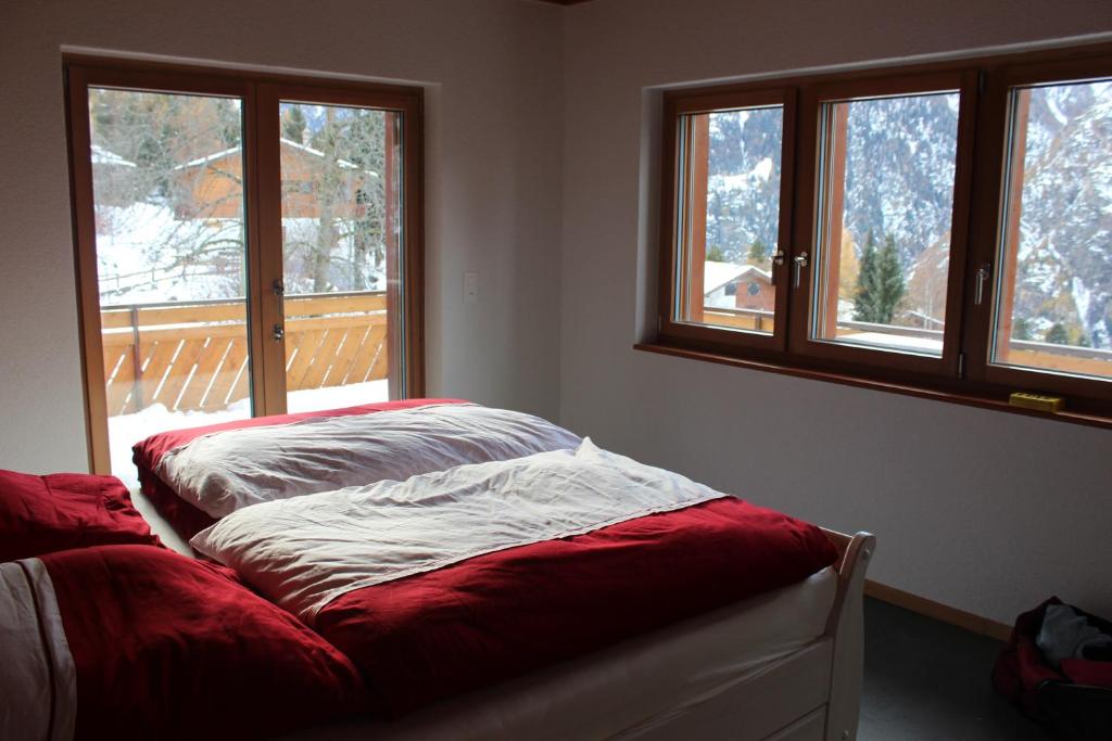 Ένα ή περισσότερα κρεβάτια σε δωμάτιο στο Chalet du Chef