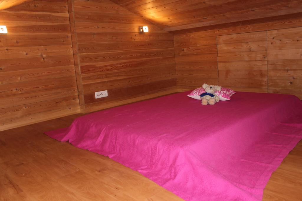 Ένα ή περισσότερα κρεβάτια σε δωμάτιο στο Chalet du Chef
