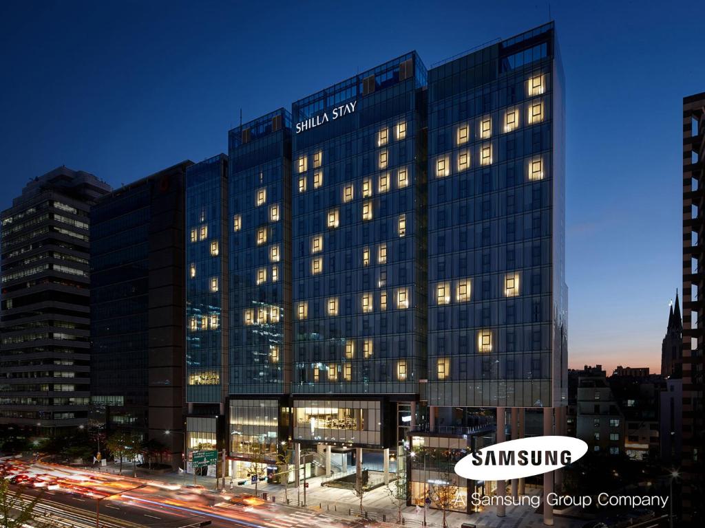 a large building with many windows in a city at Shilla Stay Gangnam Yeoksam in Seoul