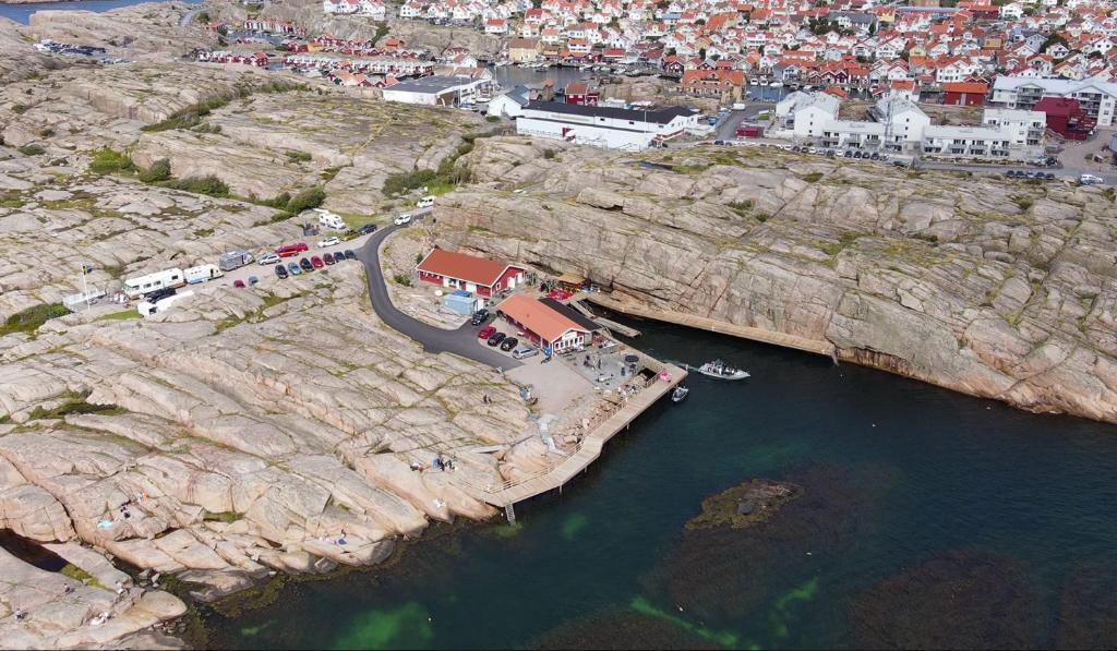 an aerial view of a town on a rocky coast at Open Water Lodge Smögen in Smögen