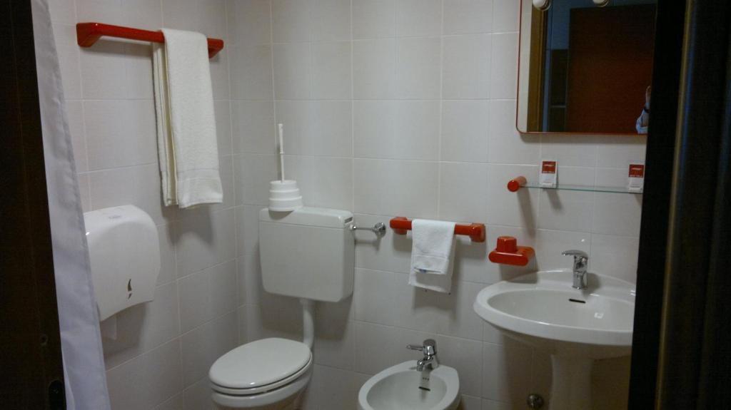 Koupelna v ubytování Albergo Casa dell'Ospite