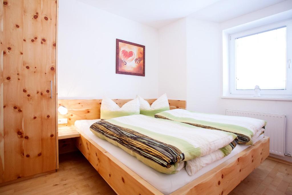 Postel nebo postele na pokoji v ubytování Ferienhaus Alex