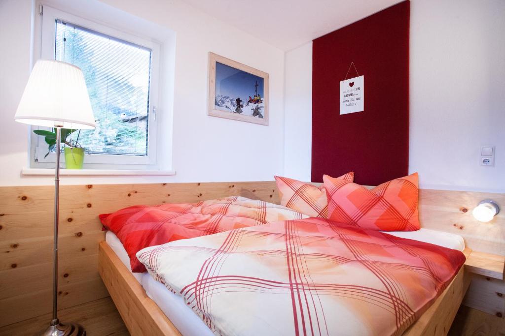 Postel nebo postele na pokoji v ubytování Ferienhaus Alex