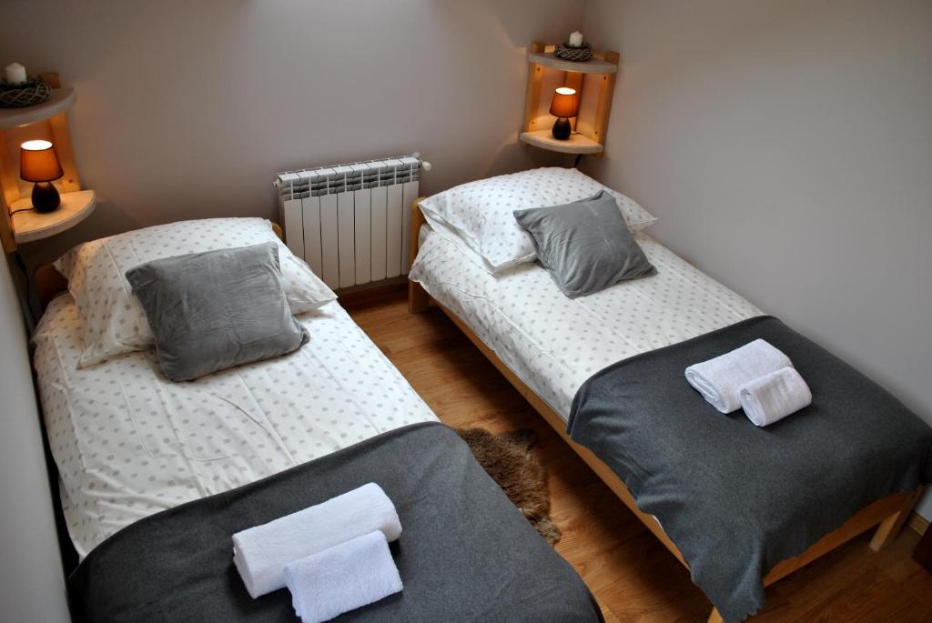 Postel nebo postele na pokoji v ubytování Willa Uroki Spisza