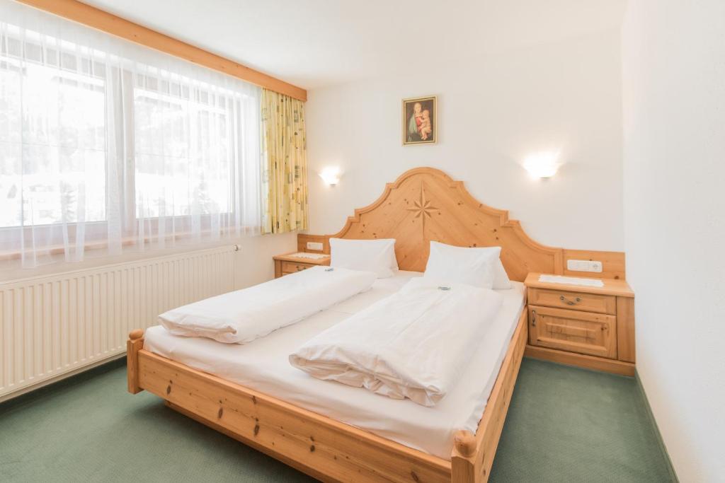 Postel nebo postele na pokoji v ubytování Pension Johannes
