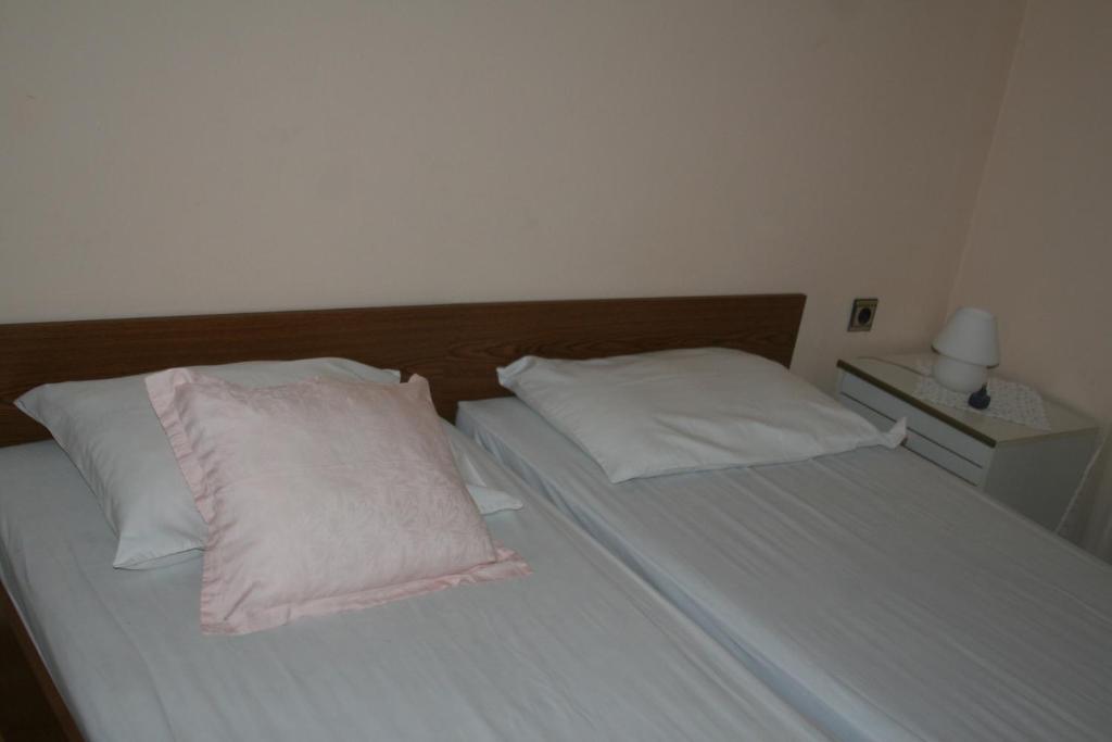 Postel nebo postele na pokoji v ubytování Apartment Grgas-Tucilo