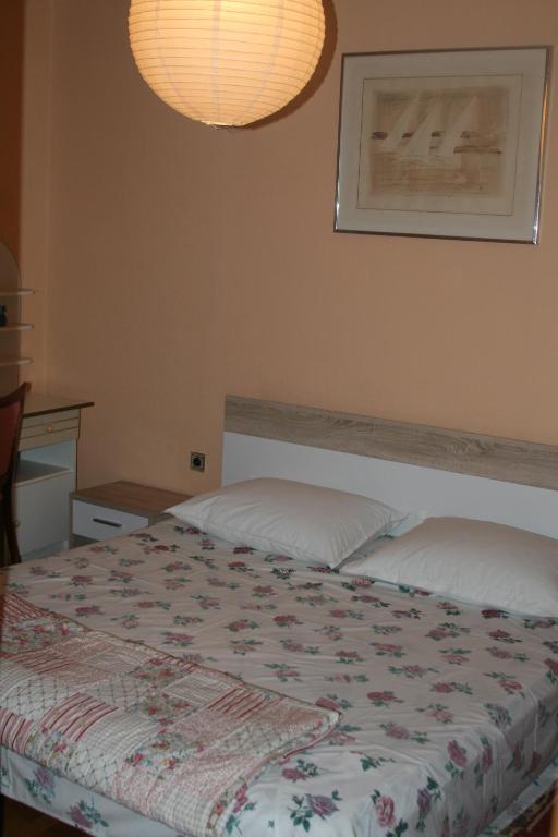Postel nebo postele na pokoji v ubytování Apartment Grgas-Tucilo