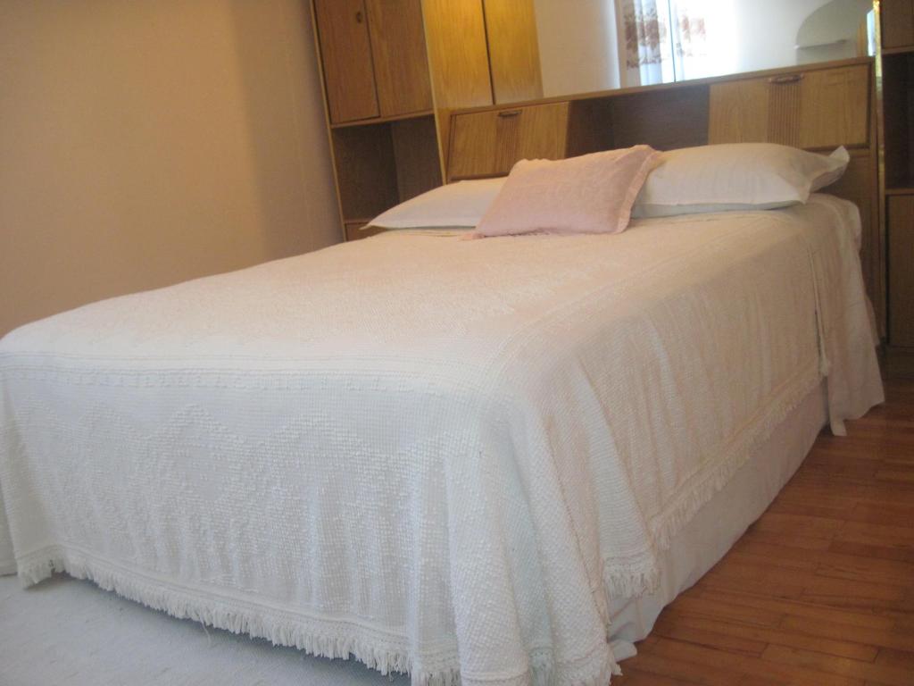 Postel nebo postele na pokoji v ubytování Apartment Grgas-Tucilo