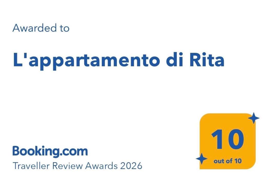 a yellow sign with the number on it at L'appartamento di Rita in Nettuno