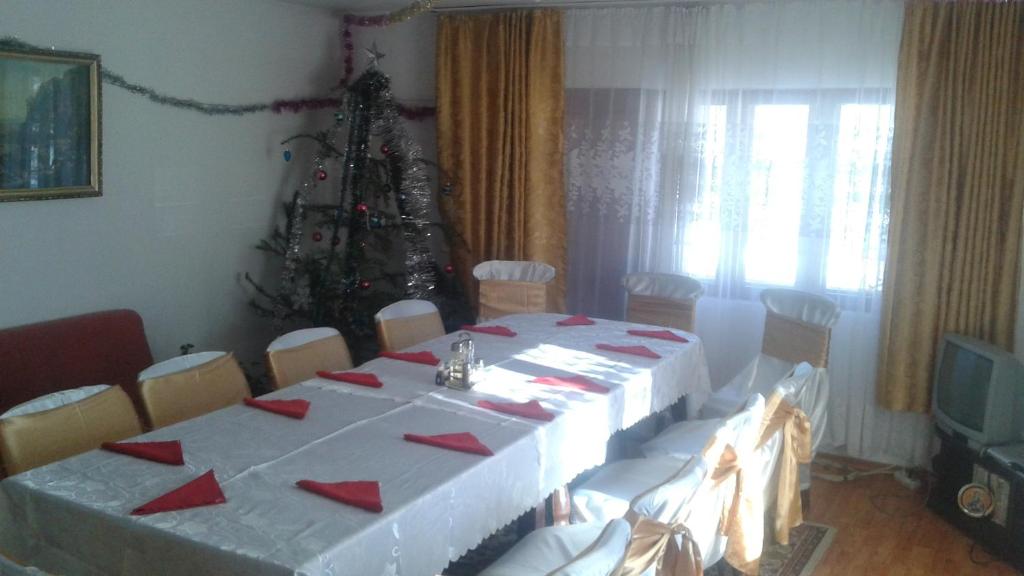 Rúm í herbergi á Nopti de Vara Transfăgărășan