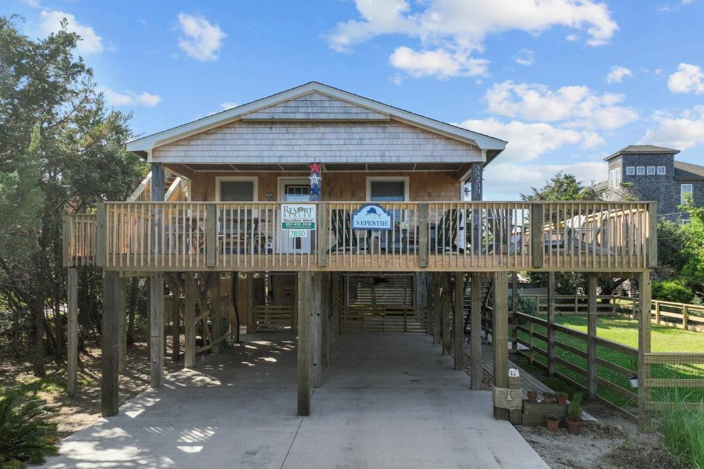 a large wooden house with a large deck at 7850 - Nepenthe in Frisco