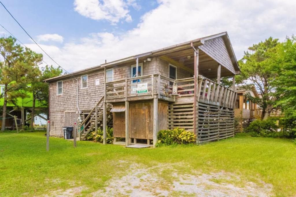 a large house with a large deck on a yard at 7602 - Drydock in Avon