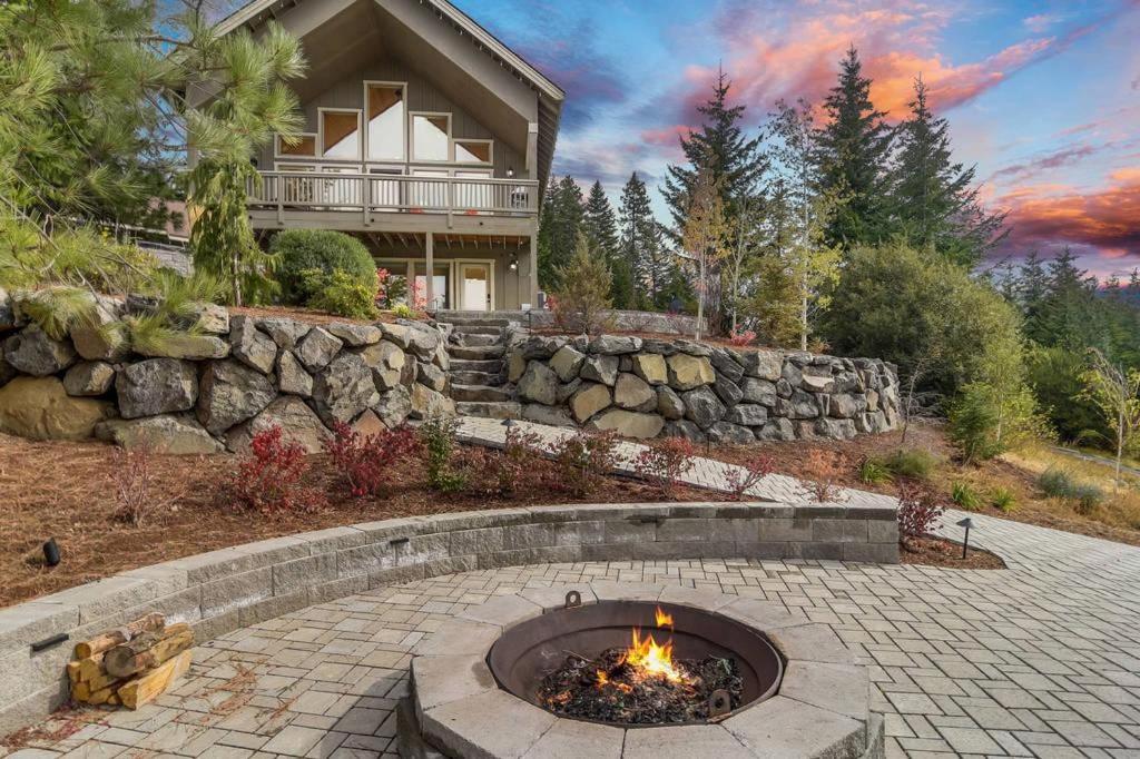 a fire pit in front of a house at Vista Ridge in Ronald
