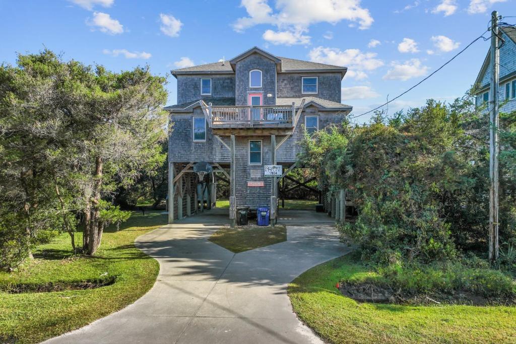 a large house with a balcony on top of it at 7834 - Royal - T in Frisco