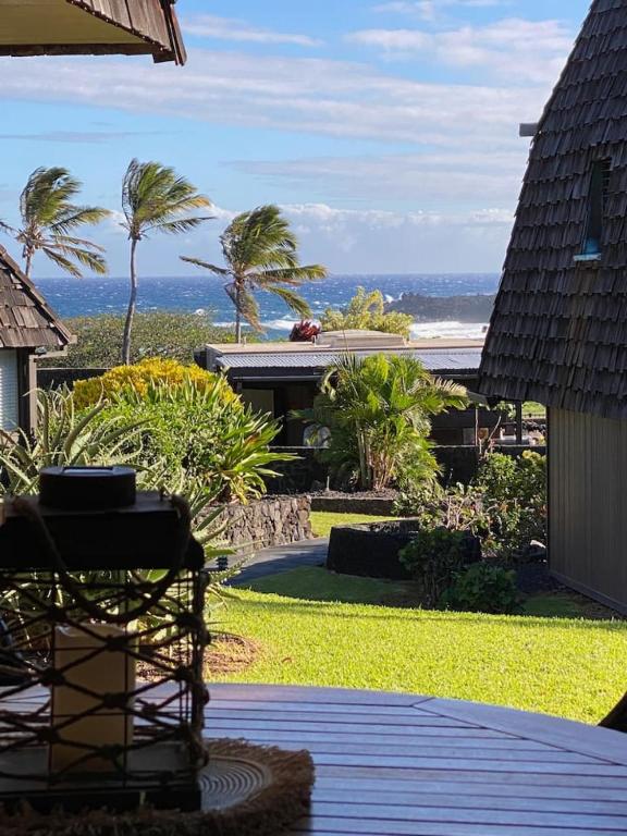 a view of the ocean from a house at 71 Dramatic Ocean and Lava in Pahala
