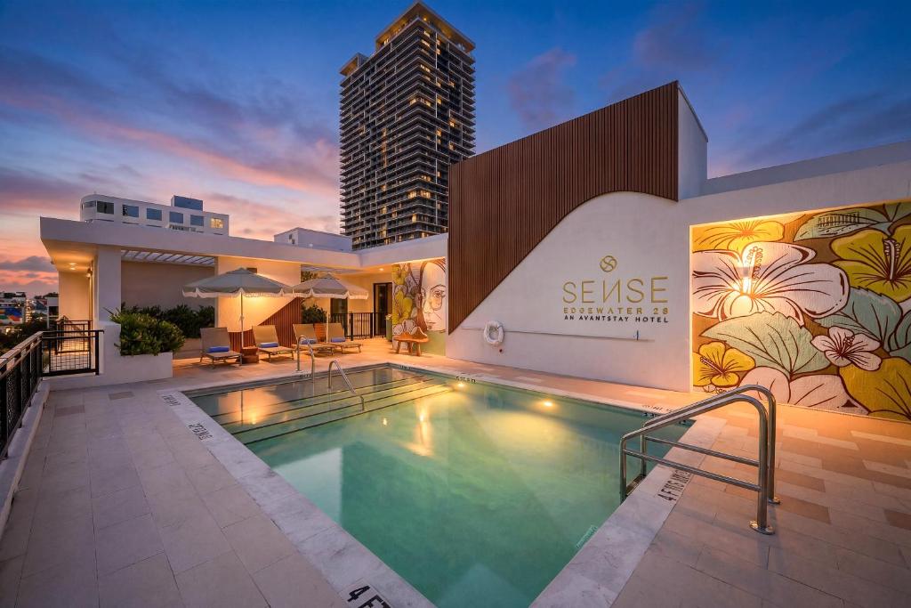 a swimming pool on the roof of a building at Sense28 Edgewater, an AvantStay Hotel in Miami