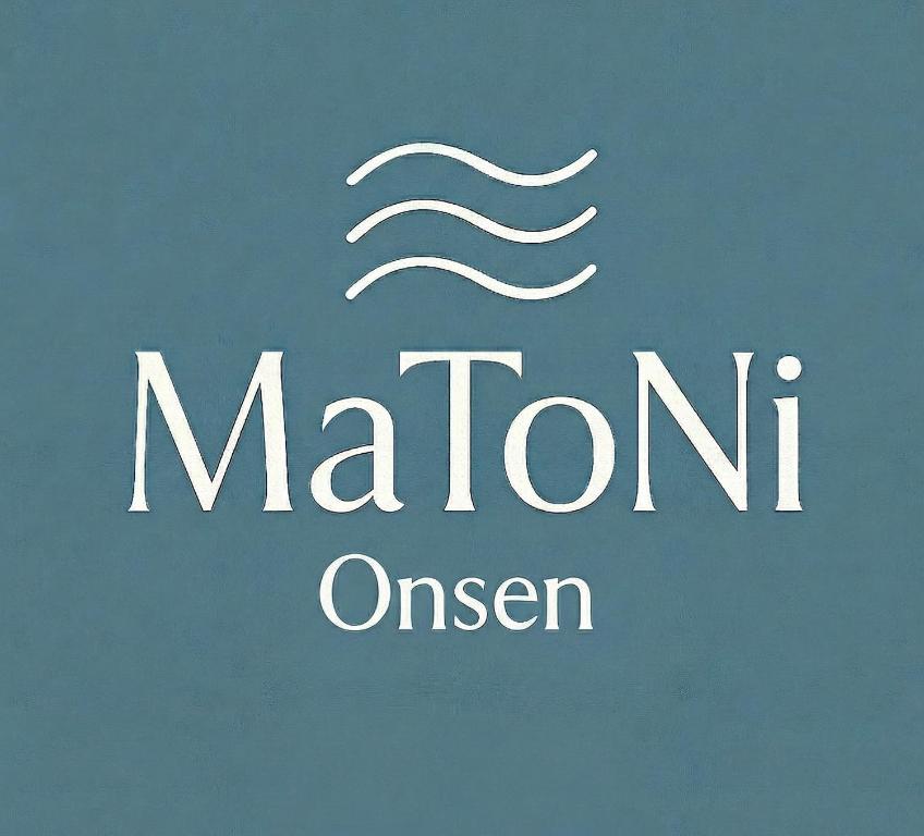 a sign that says marin onscreen with a wave at MaToNi Onsen in Phuket